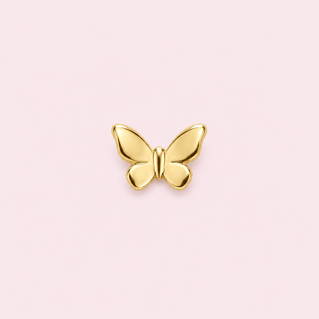 Bijou dentaire papillon doré